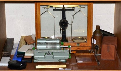 Lot 350 - An oak cased precision balance, two cameras and a quantity of slide rules; an ADM calculator; a...