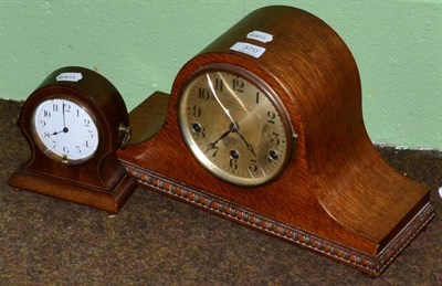 Lot 370 - An Edwardian mahogany mantel clock, together with a 1920's example (2)