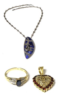 Lot 423 - A Peruvian pendant necklace, yellow metal ring stamped '585' and heart pendant