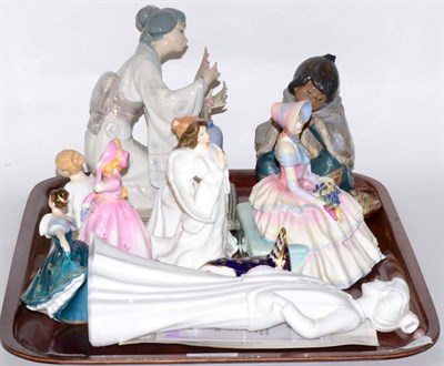 Lot 437 - A Lladro figure of a Geisha; another of a crouching child; a Royal Crown Derby paperweight of a...