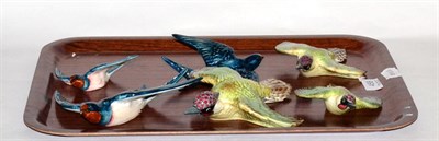 Lot 458 - Two set of three Beswick bird wall plaques, swallows and woodpeckers