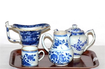 Lot 471 - Three pieces of Chinese ceramics comprising two jugs and a small cup, together with a European blue