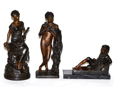 Lot 475 - Reproduction bronze of a young boy and violin, on a marble base, together with two spelter...