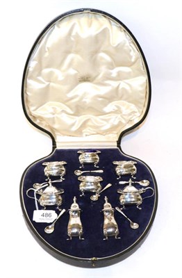 Lot 486 - A silver eight piece cruet set, E S Barnsley, Birmingham 1945, in a fitted case, 9.8ozt