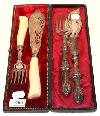 Lot 495 - Pair of early Victorian silver fish servers, together with a cased pair of ivory handled silver...