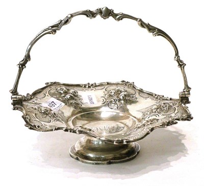 Lot 497 - Early Victorian silver shaped circular cake basket, swing handle