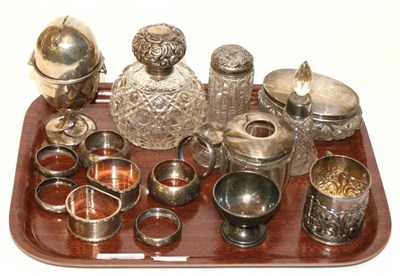 Lot 503 - Assorted silver items including napkin rings; egg form money box, inscribed 'A Nest Egg'; small mug