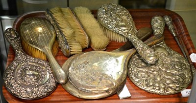 Lot 504 - Quantity of assorted silver backed dressing table brushes and mirrors