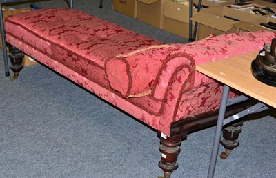 Lot 1018 - An early Victorian mahogany day bed upholstered in red silk damask