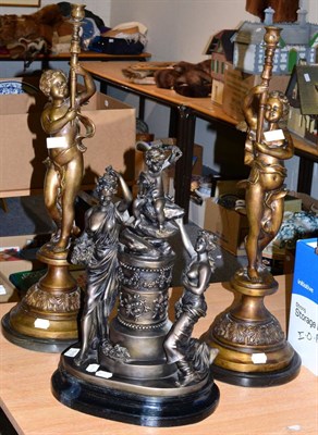 Lot 1019 - Pair of reproduction patinated metal candlesticks in the form of putti, together with a...