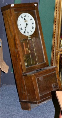 Lot 1024 - A Gledhill Brook oak cased electric clocking in machine