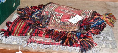 Lot 1035 - Middle Eastern Kilim rug and four salt bags (5)