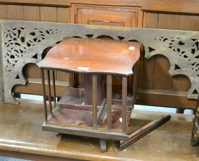 Lot 1077 - A mahogany revolving table top bookcase