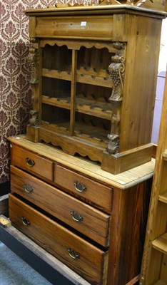 Lot 1090 - A pine chest of drawers and a wine rack (2)