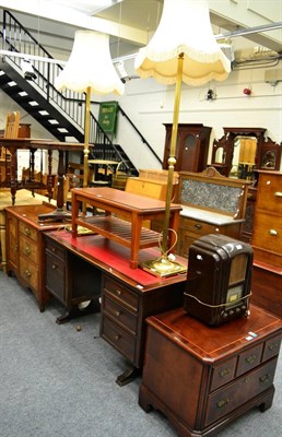 Lot 1100 - A pair of brass lacquered standards lamps, a teak occasional table, a mahogany desk and a...