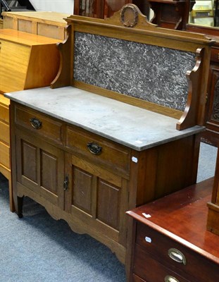 Lot 1104 - A marble topped wash stand