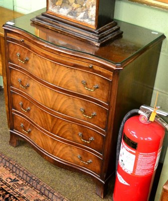 Lot 1241 - Reproduction serpentine fronted four height chest of drawers