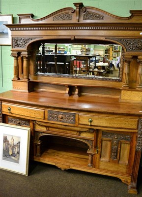 Lot 1250 - Large oak mirror back sideboard