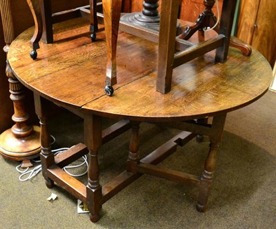 Lot 1257 - A 19th century oak gateleg dining table with a pair of bespoke table leaves