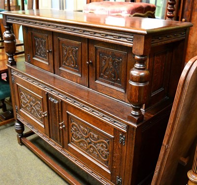 Lot 1260 - An oak court cupboard