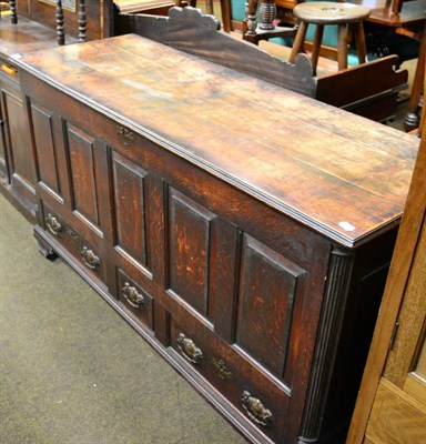 Lot 1270 - An early 19th century oak mule chest