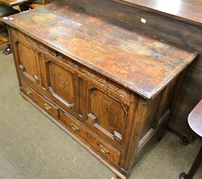 Lot 1272 - A 19th century oak coffer, fitted with two base drawers, the central panel engraved with the...