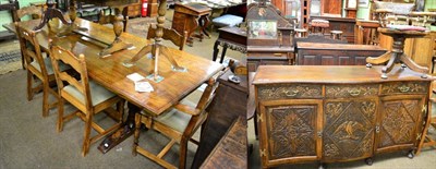 Lot 1274 - Carved oak refectory table together with six matching chairs, including two carvers, and a...