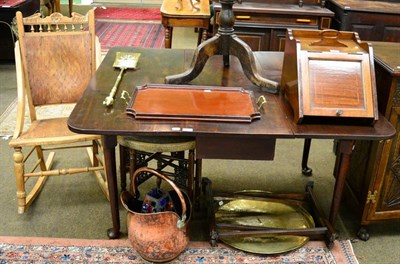 Lot 1276 - Two Middle Eastern brass topped folding tables, a rocking chair, a butler's tray, coal...