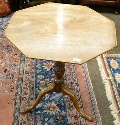 Lot 1279 - A George III mahogany tripod table with octagonal tilt top