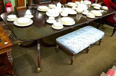 Lot 1283 - A Regency style mahogany twin pillar dining table