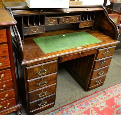 Lot 1320 - A reproduction oak roll top desk&nbsp;&nbsp