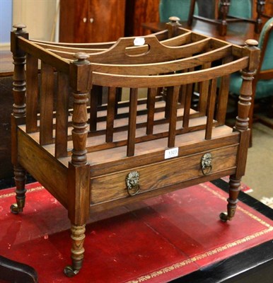 Lot 1323 - A Regency rosewood Canterbury, with five shaped dividers above a single frieze drawer, with...