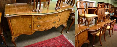 Lot 1328 - Reproduction burr walnut dining suite comprising table, six matching chairs and a sideboard