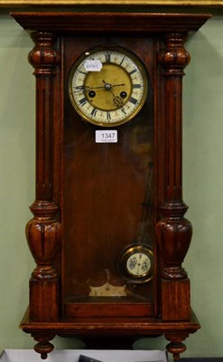 Lot 1347 - A striking wall clock