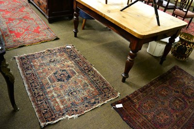 Lot 1360 - Ushak runner, West/Central Anatolia, the blood red field with a column of skeletal medallions...