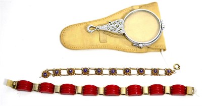 Lot 13 - A red plastic and metal link bracelet, another fancy link necklace and a lorgnette