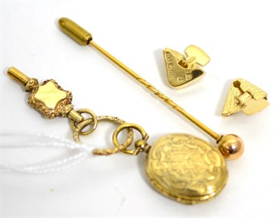 Lot 17 - A double hinged locket with hairwork, with a watch key, a pair of 9ct gold collar clips and a stick