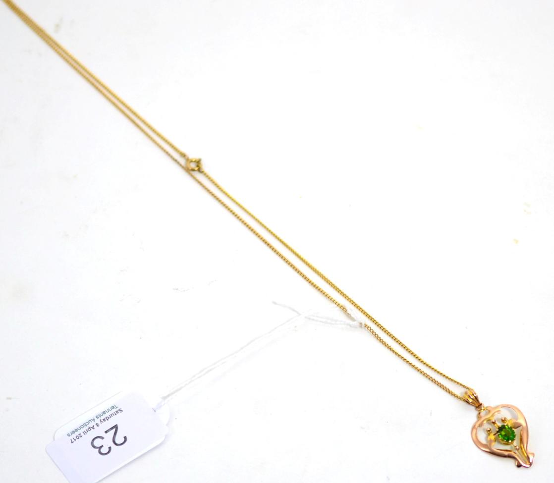 Lot 23 - An Art Nouveau green doublet necklace on chain