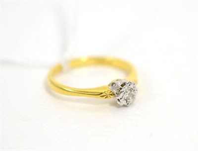 Lot 35 - An 18ct gold diamond solitaire ring, finger size K1/2