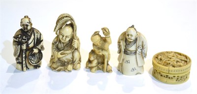 Lot 46 - Four Japanese carved ivory netsukes, figural, one with articulated head; together with a small...