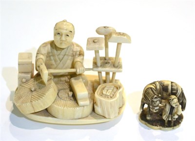 Lot 47 - A Meiji period carved ivory okimono of a craftsman together with another netsuke of similar...