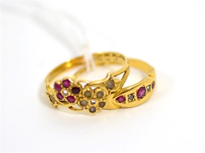 Lot 51 - A 15ct gold ruby and seed pearl ring and an 18ct gold ruby and diamond ring (2)