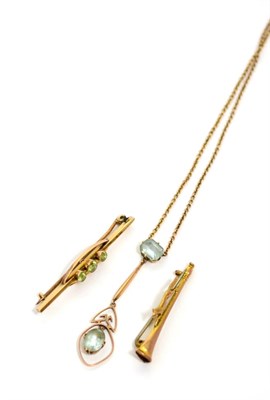 Lot 58 - A 9ct gold and gem set bar brooch; a 9ct gold hunting brooch and a 9ct gold and gem set pendant...