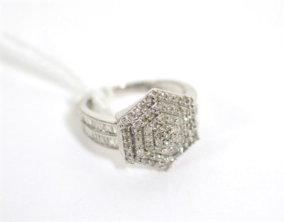 Lot 61 - A 9ct white gold diamond cluster ring, finger size N1/2