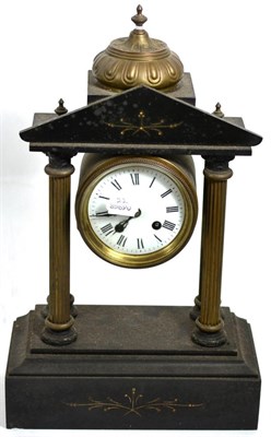 Lot 106 - A 19th/20th century gilt metal and slate striking portico clock of architectural form