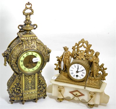 Lot 117 - A gilt metal and alabaster figural mantel clock together with a brass mantel clock in the Classical