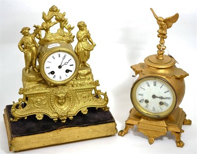 Lot 120 - A gilt metal figural striking mantel clock together with another gilt metal mantel clock (2)