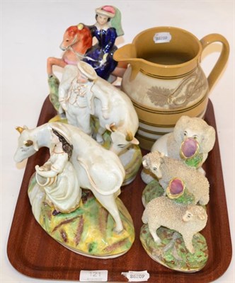 Lot 121 - A group of 19th century Staffordshire figures and a 19th century mocca ware jug decorated with...