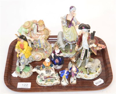 Lot 122 - A group of 19th century continental porcelain figures together with a cock and hen enamel...