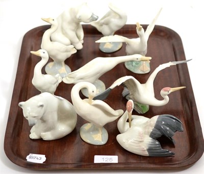 Lot 125 - Two Lladro polar bear figures and eight Lladro geese